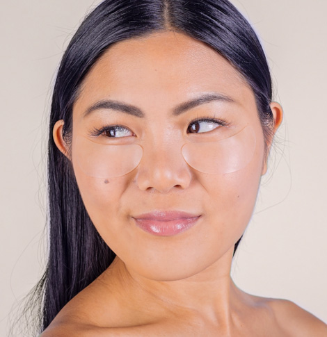 model wearing silcskin eye pads